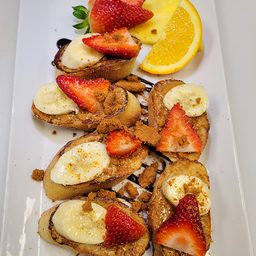 Baguette French toast with strawberries and banana at Cedar North, London Ontario