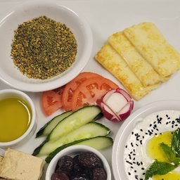 Cedar Breakfast platter with labneh, halloumi, zaatar and olives at Cedar North, London Ontario