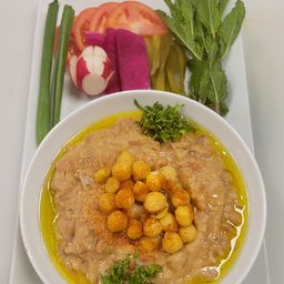 Foul medames fava beans with chickpeas and olive oil at Cedar North, London Ontario