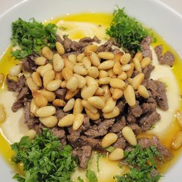 Hummus topped with sirloin beef and pine nuts at Cedar North, London Ontario