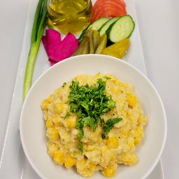 Plain musabaha whole chickpeas with parsley at Cedar North, London Ontario
